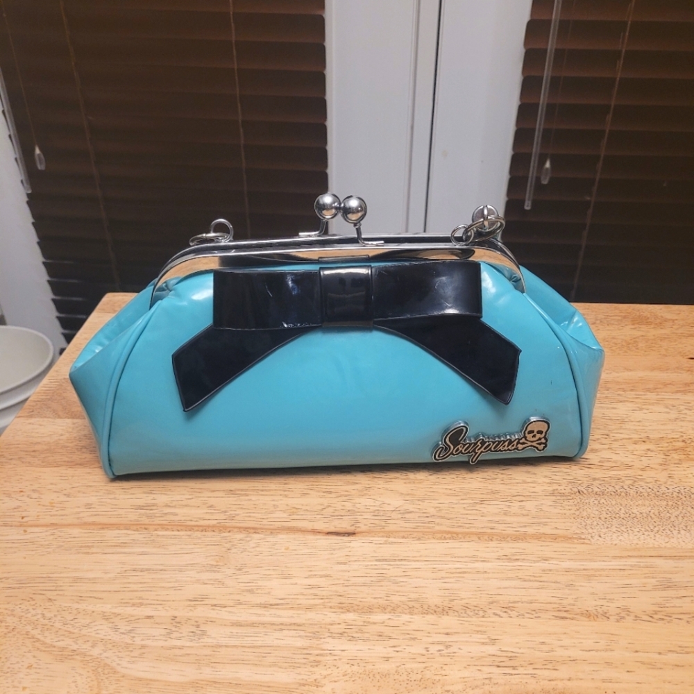 Sourpuss purse